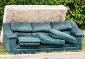 Example of bulky item pickup couch and mattress at curb