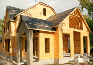 wood frame single-family house under construction 