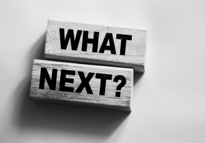 wooden blocks with words "What Next?"